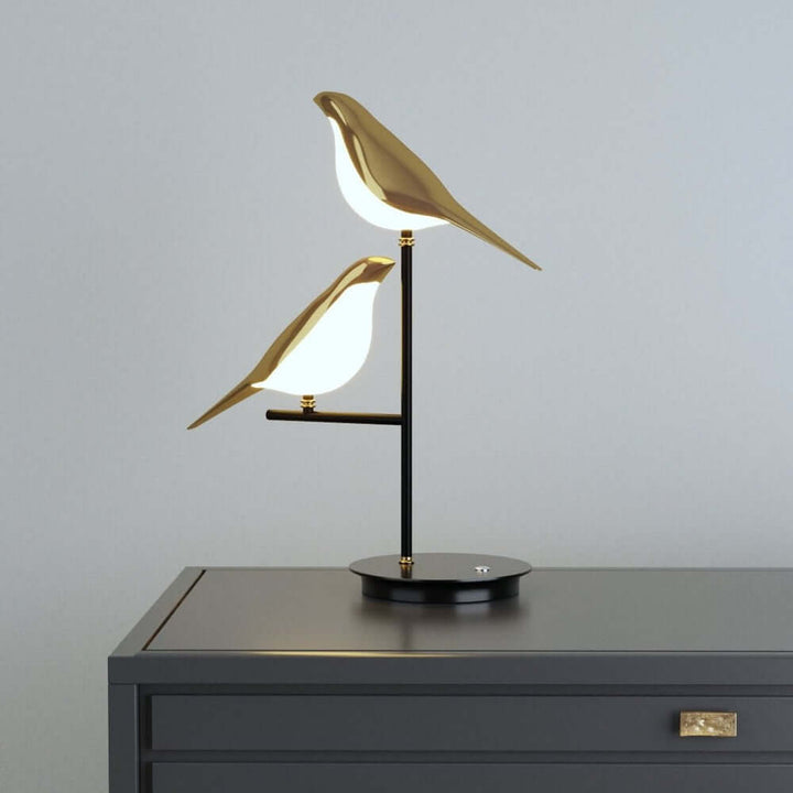 Elegancka lampa biurkowa LED z ptasim designem