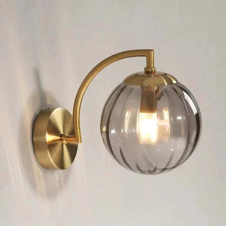 Szklany kinkiet ścienny LED z designem żyrandola