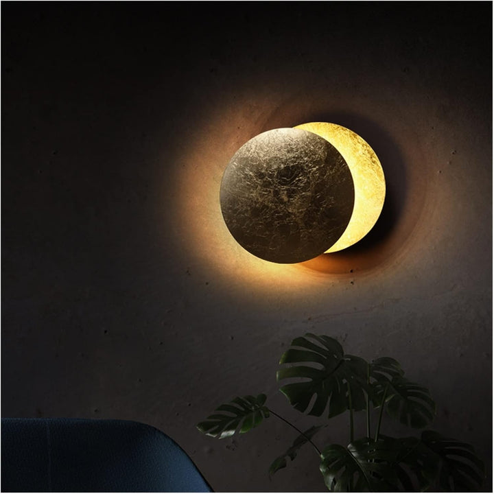 Nowoczesna lampa ścienna LED Scandina - kształt zaćmienia