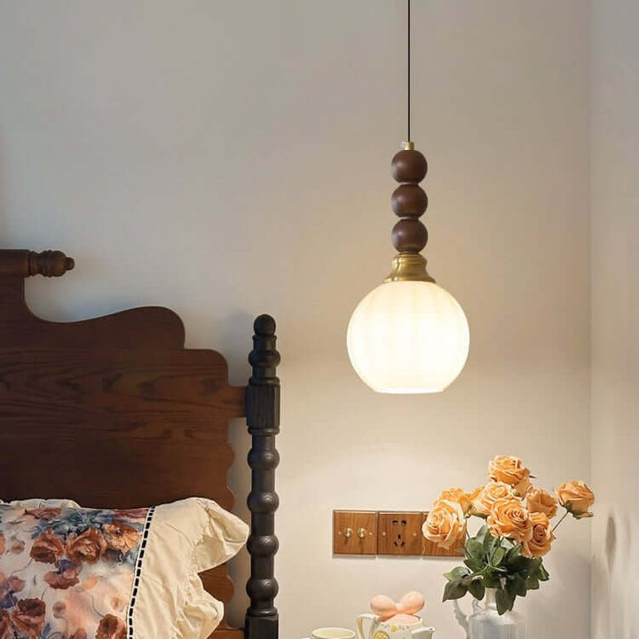 Elegancka szklana, drewniana i metalowa lampa wisząca