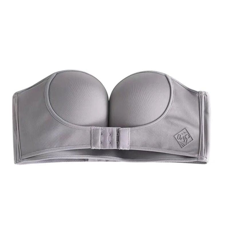 Elegancki biustonosz bez ramiączek w kolorze nude zapewniający dyskretne podtrzymanie.