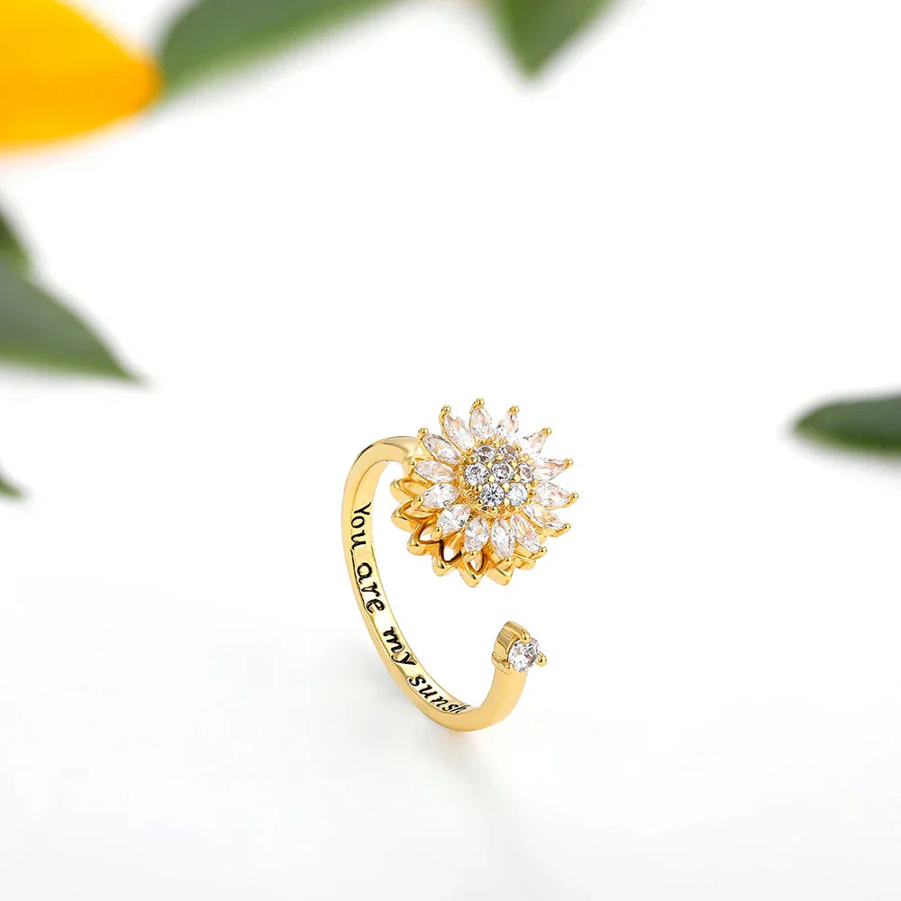 "Bague d'anxiété ajustable en acier inoxydable, cristal tournesol lumineux, design élégant, apaisant et moderne."
