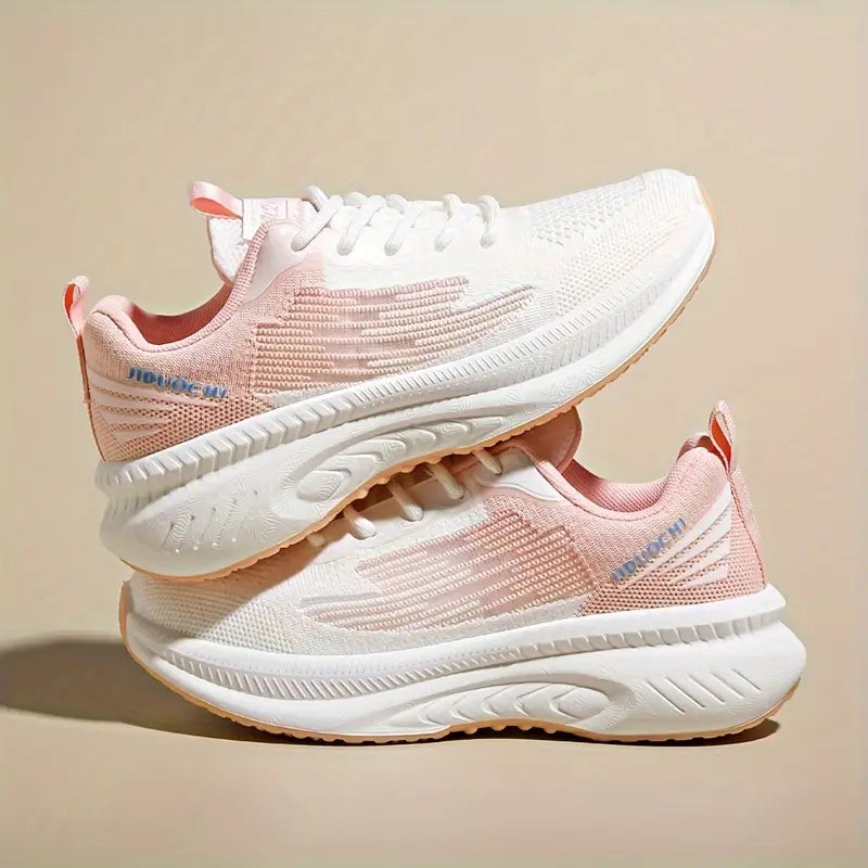 Damskie ortopedyczne buty sportowe w pastelowym różu, lekkie i oddychające, nowoczesny design dla codziennego komfortu i stylu.