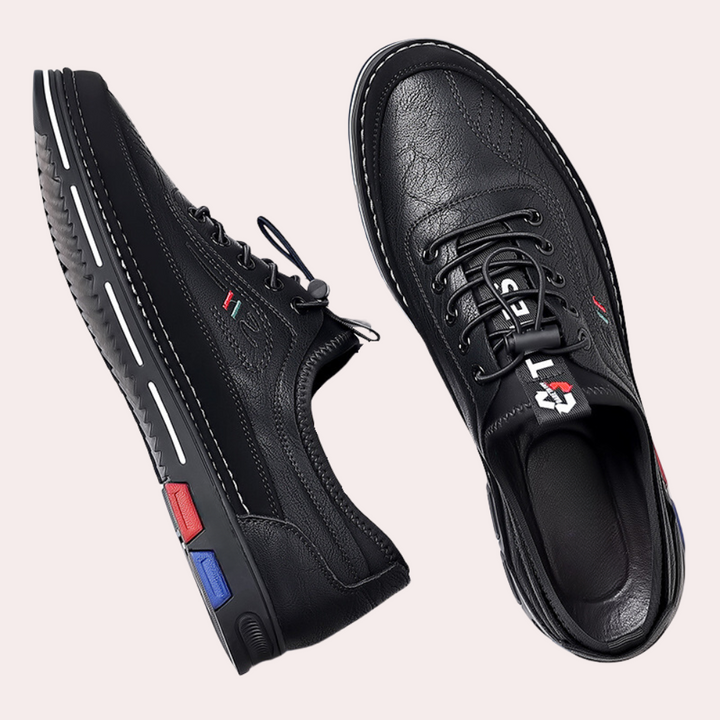 Eleganckie, lekkie i wszechstronne czarne sneakersy męskie o ponadczasowym designie, pasujące do każdego stylu.