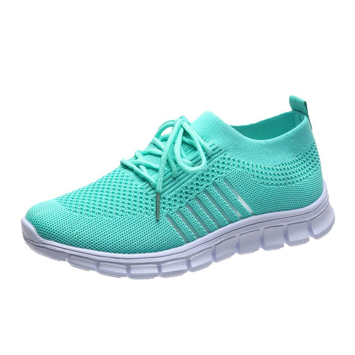Damskie buty ortopedyczne, nowoczesny design, oddychający szary materiał, wkładka ortopedyczna dla optymalnego komfortu i wsparcia.