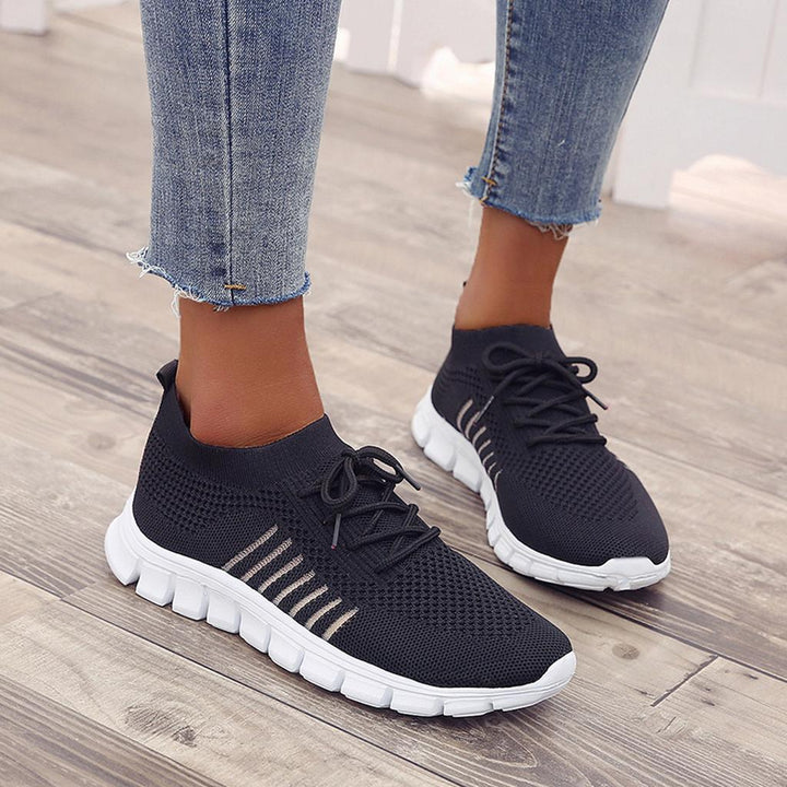 Damskie buty ortopedyczne, nowoczesny design, oddychający szary materiał, wkładka ortopedyczna dla optymalnego komfortu i wsparcia.