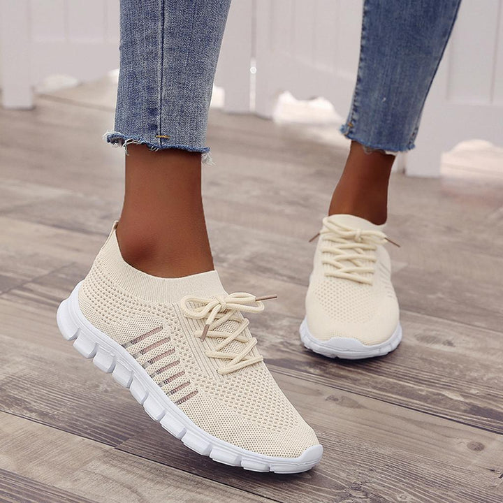 Damskie buty ortopedyczne, nowoczesny design, oddychający szary materiał, wkładka ortopedyczna dla optymalnego komfortu i wsparcia.