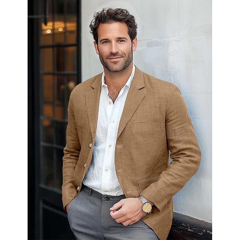 Szykowna męska marynarka w kolorze niebieskim, luźny krój, czarne guziki, dla profesjonalnej i codziennej elegancji.