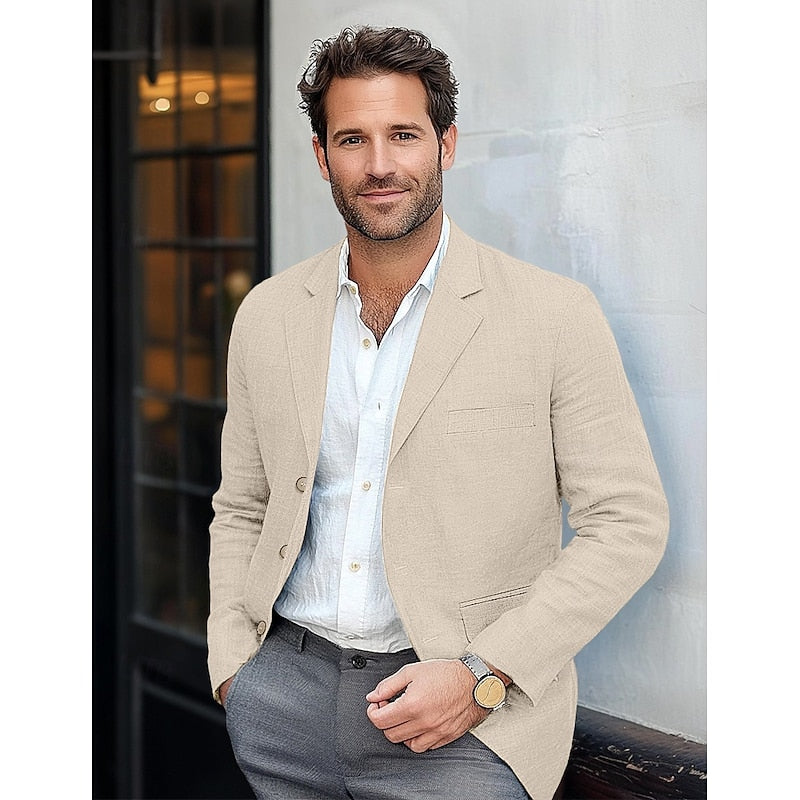 Szykowna męska marynarka w kolorze niebieskim, luźny krój, czarne guziki, dla profesjonalnej i codziennej elegancji.