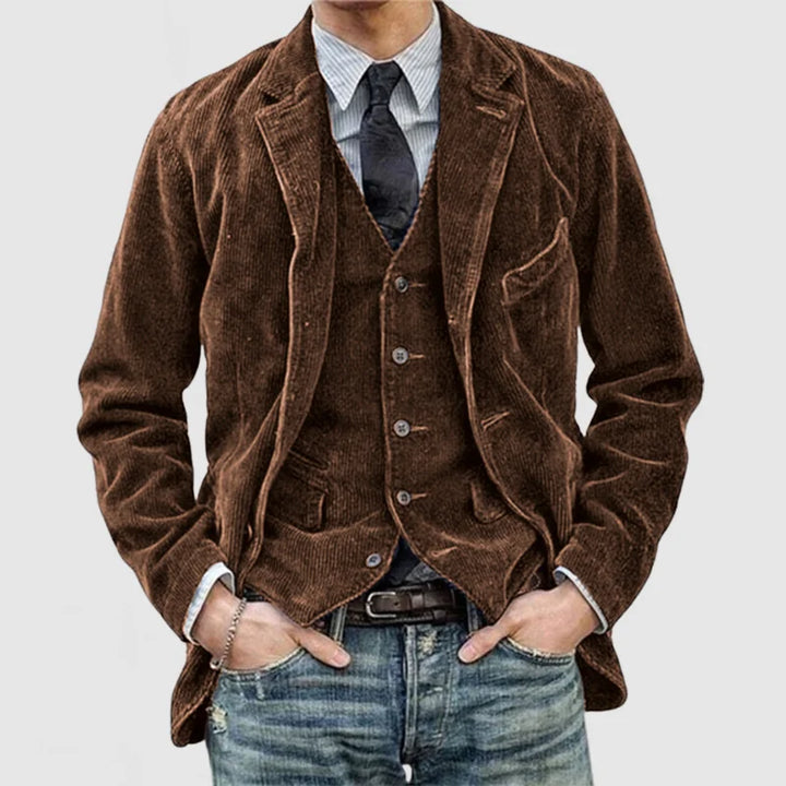 Elegancka damska marynarka vintage w kolorze granatowym, z dopasowanym krojem i długim rękawem, idealna na ponadczasowy i wszechstronny look.