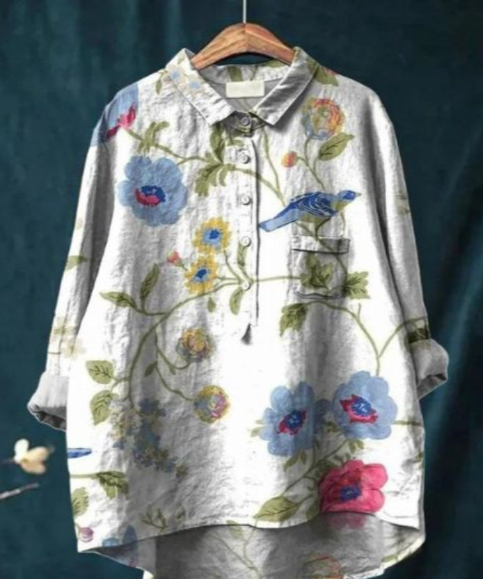 Jedwabna bluzka z kwiatowym wzorem, długimi rękawami, dekoltem w serek, elegancka i wygodna, na każdą okazję.