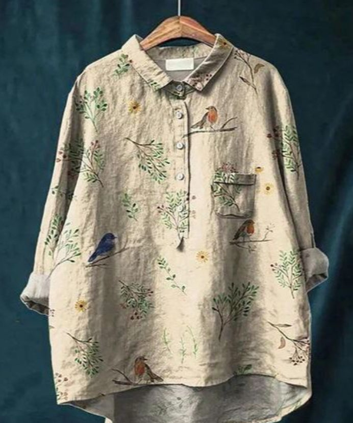 Jedwabna bluzka z kwiatowym wzorem, długimi rękawami, dekoltem w serek, elegancka i wygodna, na każdą okazję.