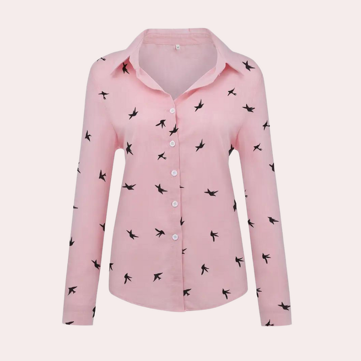 Elegancka bluzka damska Laumina w kolorze różowym, z długimi rękawami, nowoczesny design dla wszechstronnego i wyrafinowanego wyglądu.