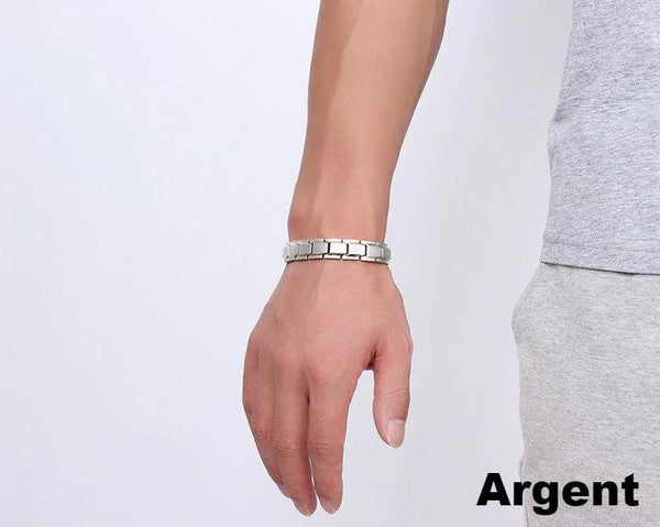 Elegancka bransoletka magnetyczna w kolorze czarnym i srebrnym, z kamieniami ochry, oferująca równowagę energetyczną i korzyści terapeutyczne.