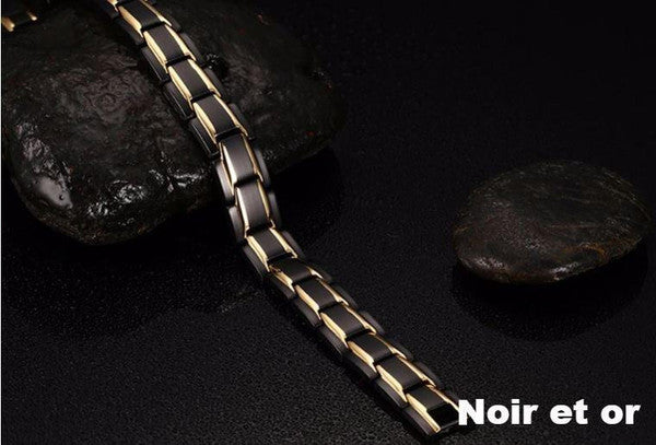 Elegancka bransoletka magnetyczna w kolorze czarnym i srebrnym, z kamieniami ochry, oferująca równowagę energetyczną i korzyści terapeutyczne.