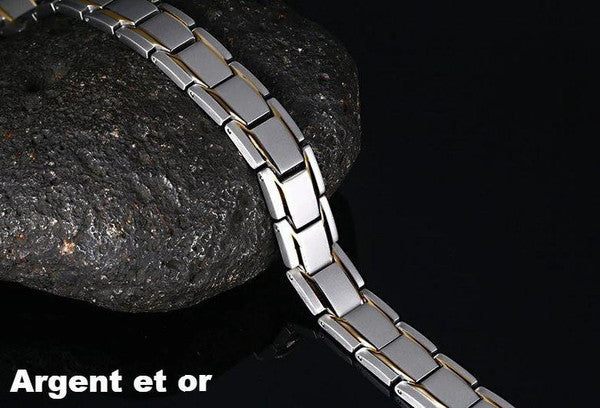 Elegancka bransoletka magnetyczna w kolorze czarnym i srebrnym, z kamieniami ochry, oferująca równowagę energetyczną i korzyści terapeutyczne.