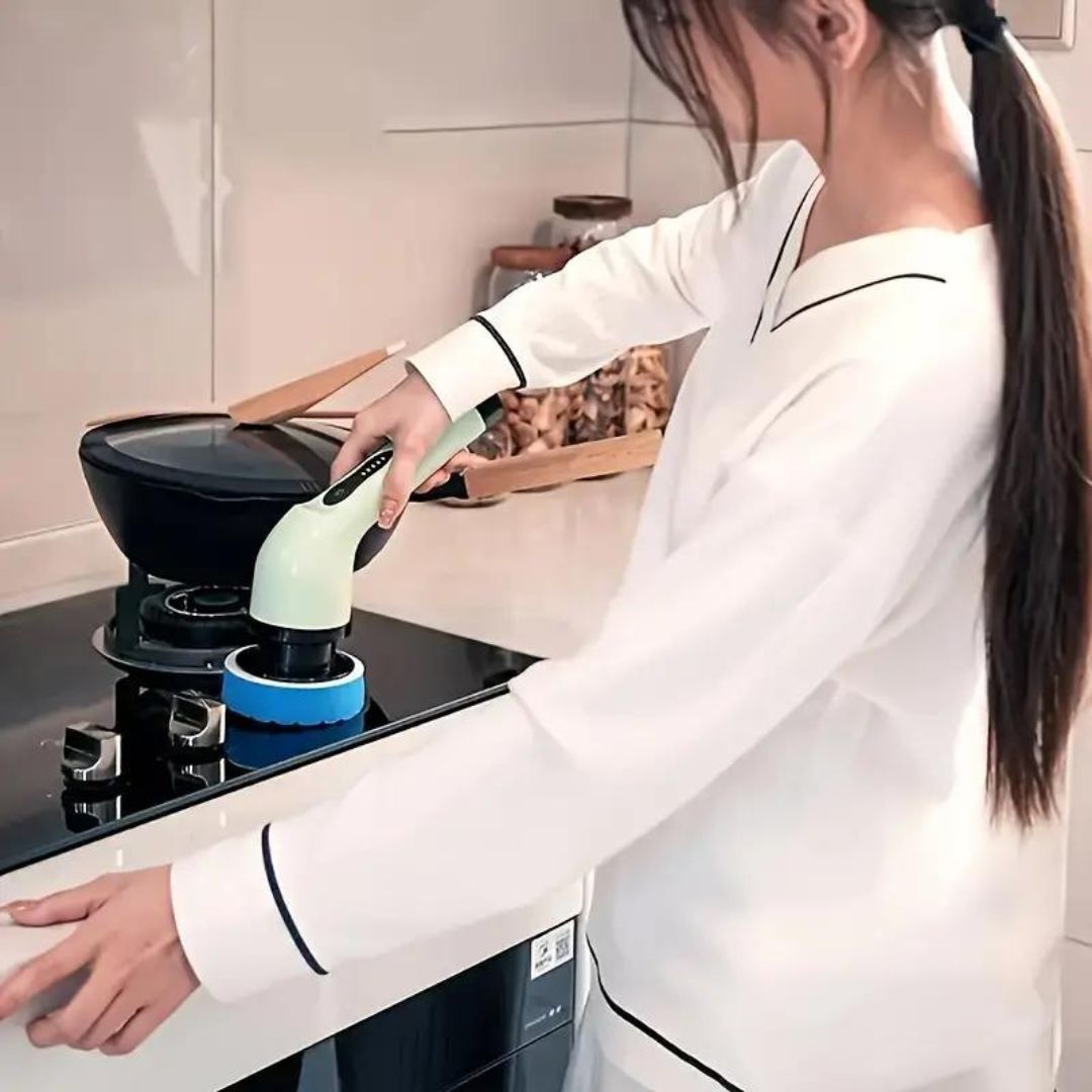 Automatyczna szczotka czyszcząca 9w1 w kolorze białym i zielonym z 9 wymiennymi głowicami do różnych powierzchni.