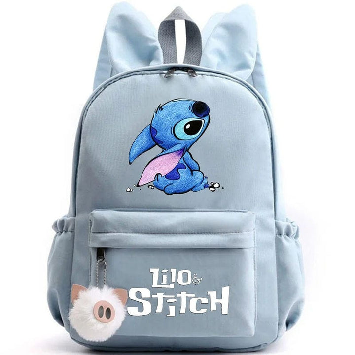 "Cartable enfant Stitch bleu avec motif amusant et porte-clés, design pratique et adorable pour école."