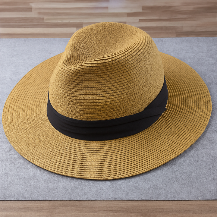 Chapeau Panama en paille toquilla beige, large bord, style élégant et intemporel, idéal pour protection solaire et mode estiv