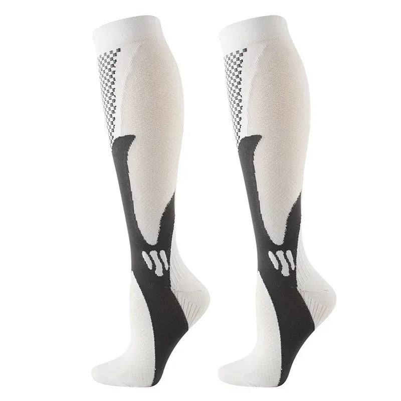 Chaussettes de compression noires et grises, renforcées, pour confort et circulation optimale, idéales sport et daily use.