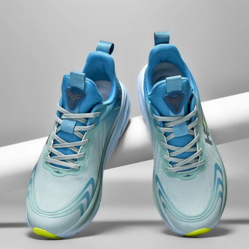 Lekkie buty do biegania damskie w kolorze czarno-białym, z amortyzacją, nowoczesny design, widok z boku