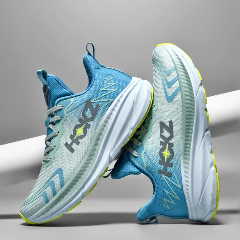 Lekkie buty do biegania damskie w kolorze czarno-białym, z amortyzacją, nowoczesny design, widok z boku