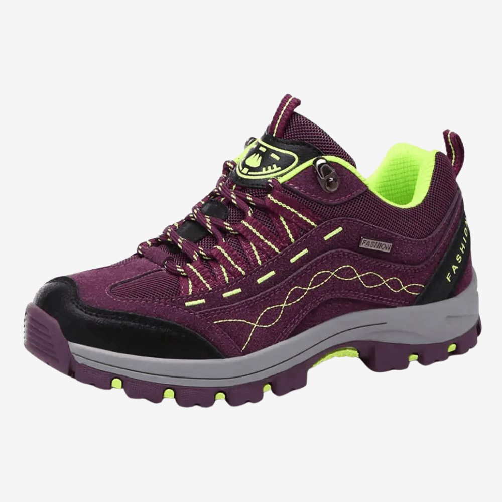 Damskie wodoodporne, wytrzymałe buty trekkingowe, widok z boku, antypoślizgowa podeszwa, komfort i trwałość, elegancki design.