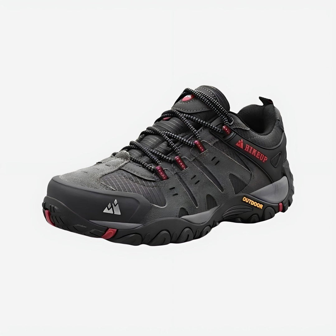 Wytrzymałe męskie buty trekkingowe, antypoślizgowa podeszwa, nowoczesny design, idealne na górskie tereny, wysoki komfort.