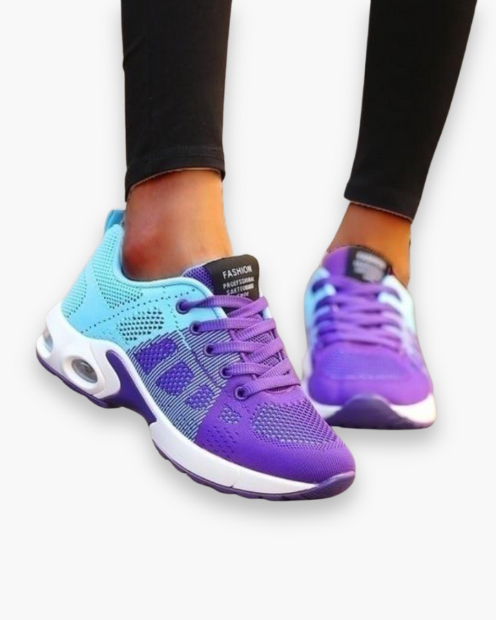 Lekkie buty sportowe dla kobiet, nowoczesny design, oddychający materiał, amortyzująca podeszwa, atrakcyjny kolor.