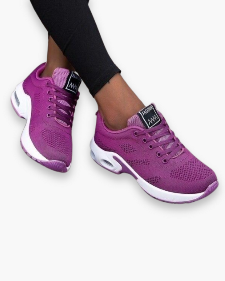 Lekkie buty sportowe dla kobiet, nowoczesny design, oddychający materiał, amortyzująca podeszwa, atrakcyjny kolor.