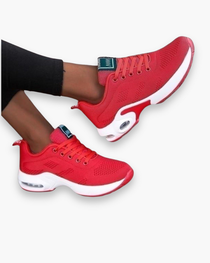 Lekkie buty sportowe dla kobiet, nowoczesny design, oddychający materiał, amortyzująca podeszwa, atrakcyjny kolor.