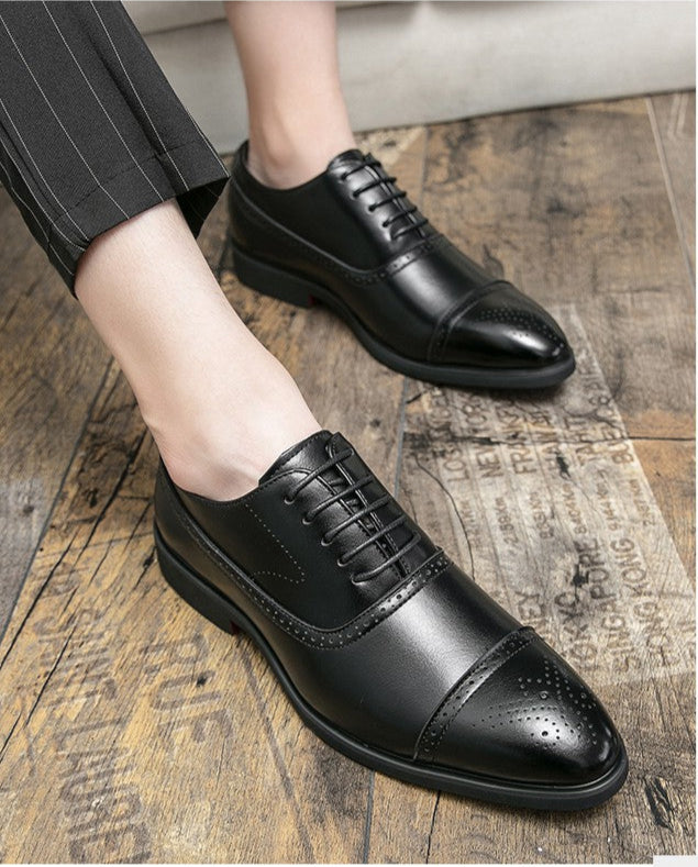 Męskie buty Oxford ze skóry licowej, eleganckie i klasyczne, w kolorze czarnym, z precyzyjnymi detalami brogue.