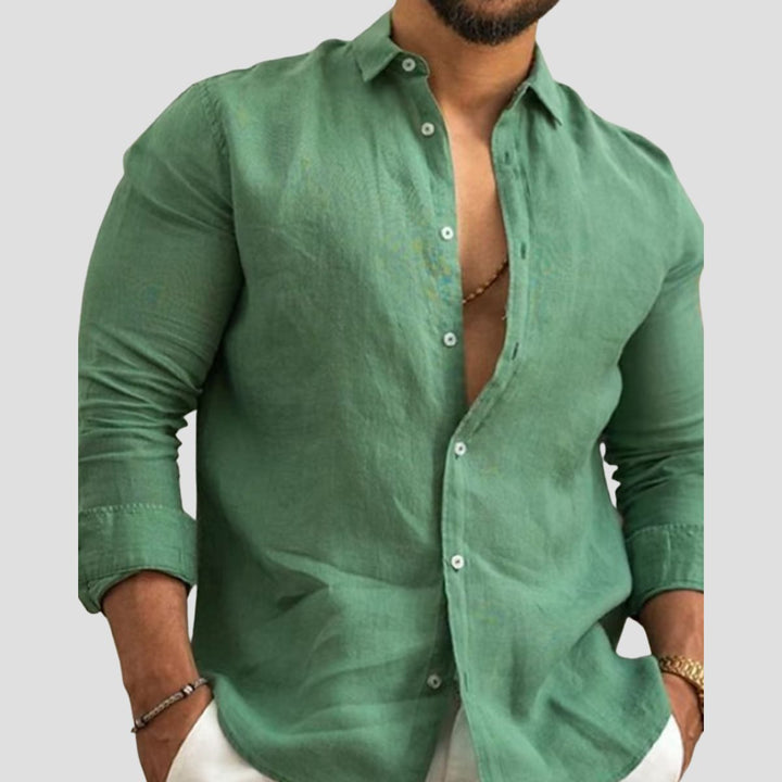 Męska koszula bawełniana, lekka i przewiewna, klasyczny strukturalny kołnierz, podwijane długie rękawy, swobodny wygląd.