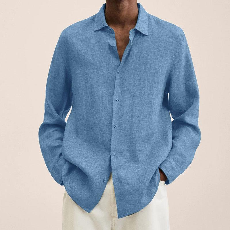 "Chemise en lin homme élégante à manches longues, tissu bleu marine léger et respirant, idéale pour diverses occasions."