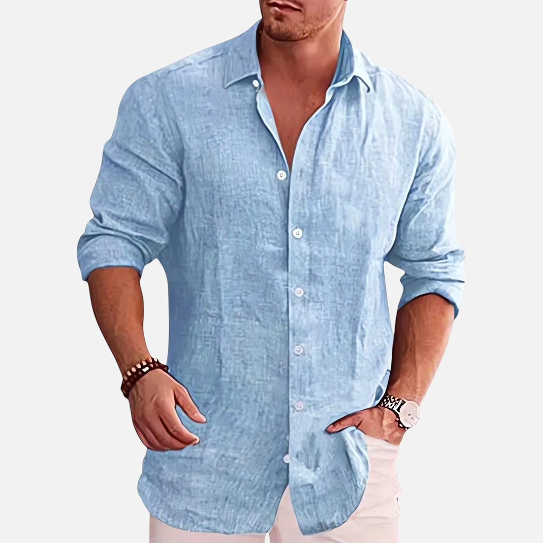 Męska koszula lniana, elegancka, z długim rękawem, o lekkiej i oddychającej teksturze, idealna na lato i casualowe okazje.