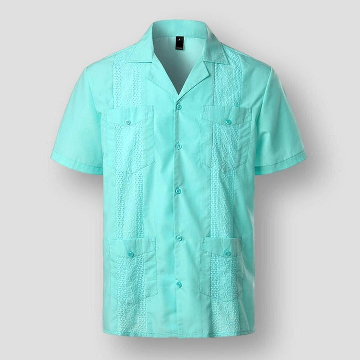 Męska koszula z haftem karaibskim, włoski kołnierzyk, miękki materiał premium, elegancka, cztery praktyczne kieszenie, komfort, wyspiarski styl.