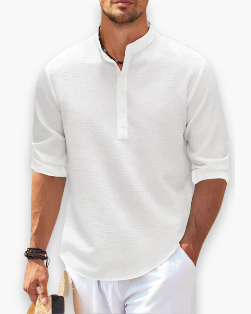 Elegancka koszula męska ze stójką, nowoczesna i luźna, idealna na codzienne wyjścia i formalne okazje.