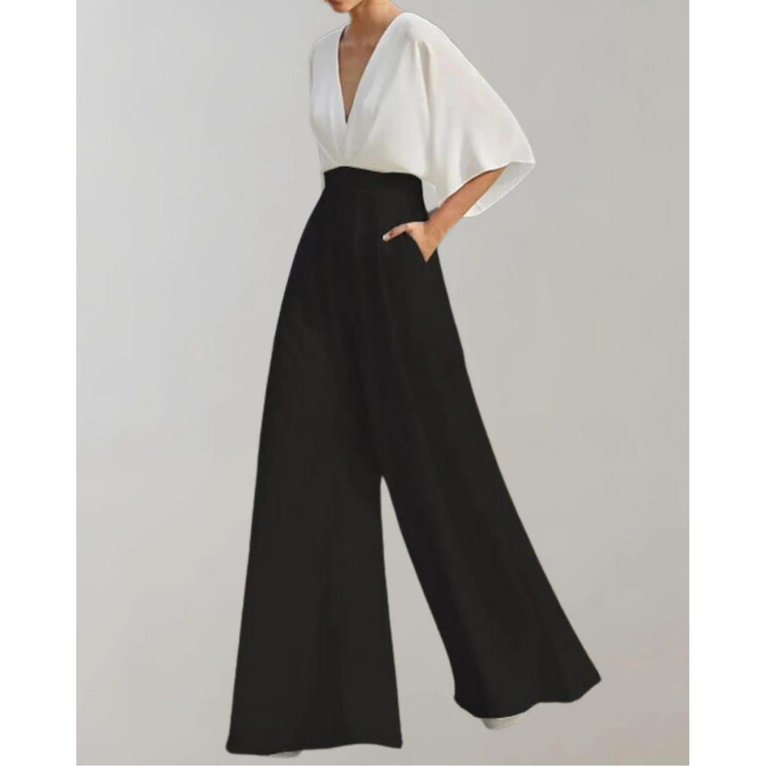 Dopasowany i elegancki kombinezon damski z lejącego materiału, z korzystnym krojem, w modnym kolorze, idealny na dzień i wieczór.