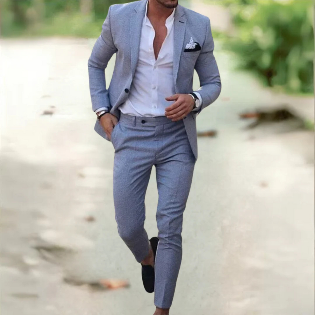 Elegancki męski garnitur slim fit, dopasowany krój, lekki materiał, na białym tle, idealny na formalne i biznesowe okazje.