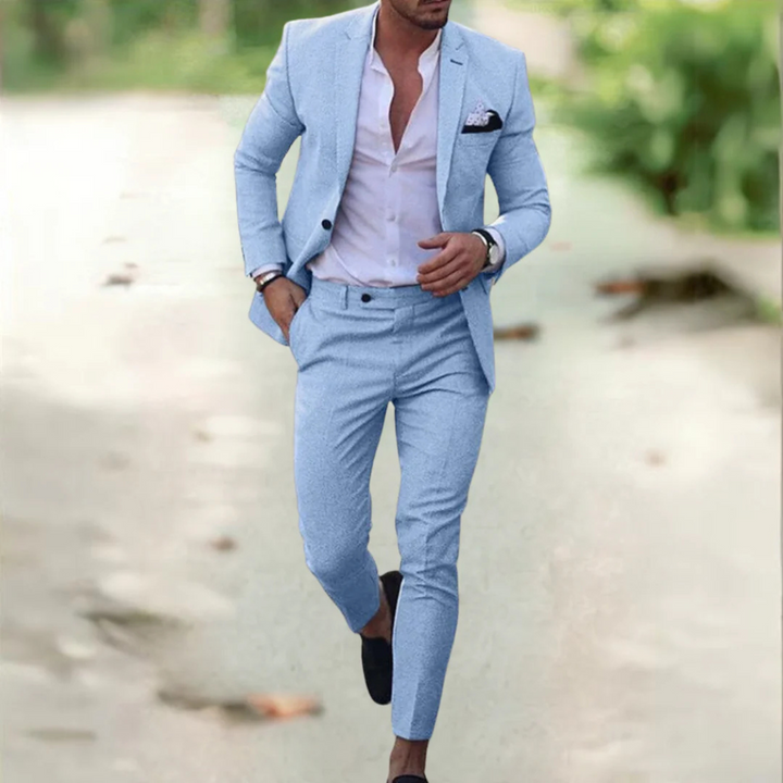 Elegancki męski garnitur slim fit, dopasowany krój, lekki materiał, na białym tle, idealny na formalne i biznesowe okazje.