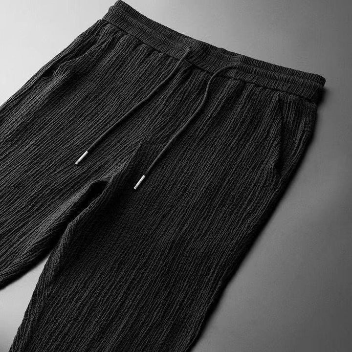 Męski letni komplet lniany, przewiewna koszula i pasujące szorty, elegancki i wygodny na sezon letni.