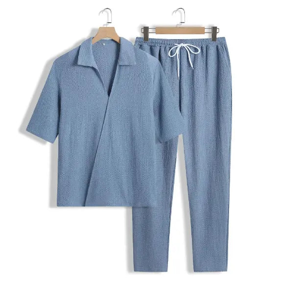 Nowoczesny dwuczęściowy zestaw męski, elegancki krój casual, neutralna tonacja, luźny fason, idealny na każdą okazję.