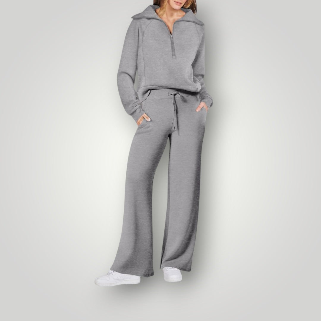 Stylowy i wygodny damski zestaw loungewear, bluza i pasujące spodnie w neutralnych odcieniach, idealny do relaksu i na wyjścia.
