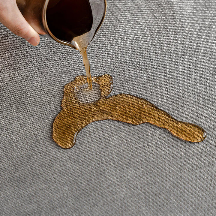 Nowoczesny pokrowiec na kanapę odporny na zadrapania, elegancki design, ekologiczny, chroni powierzchnię, idealny dla zwierząt domowych.