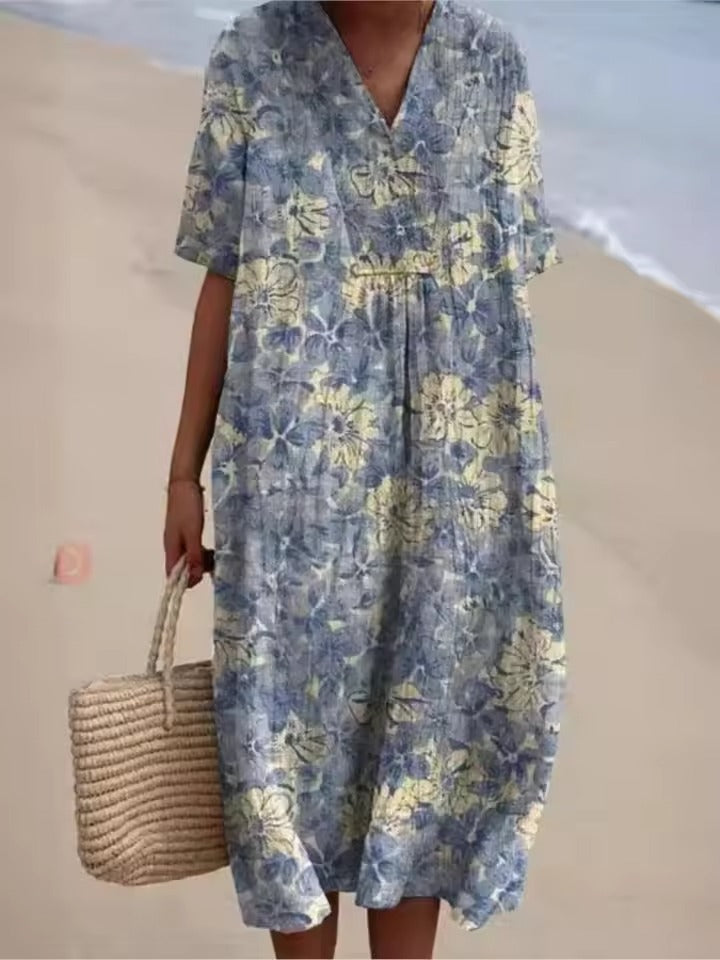 Letnia sukienka damska Odile z bawełny i lnu, z kwiecistym wzorem, eleganckim i wygodnym krojem, idealna na letnie dni.