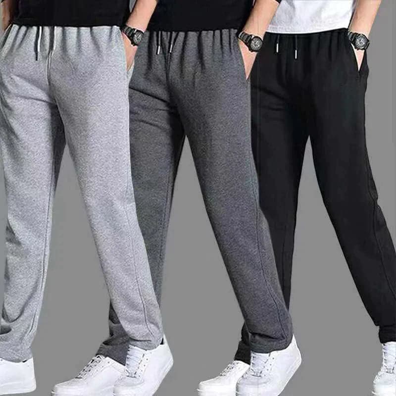 Czarne joggery męskie w miejskim stylu, z wąskimi nogawkami i praktycznymi kieszeniami na zamek.