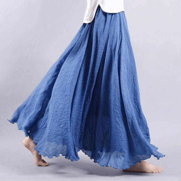 Długa spódnica boho w kolorze beżowym, z płynnym krojem, elastycznym pasem, idealna na elegancki i wygodny letni styl.