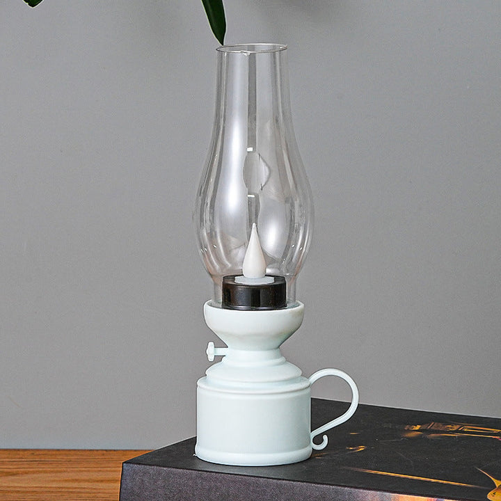 Elegancka lampa olejowa LED z realistycznym efektem płomienia i wyborem kolorów, idealna do stworzenia ciepłej atmosfery i bezpiecznego dopasowania