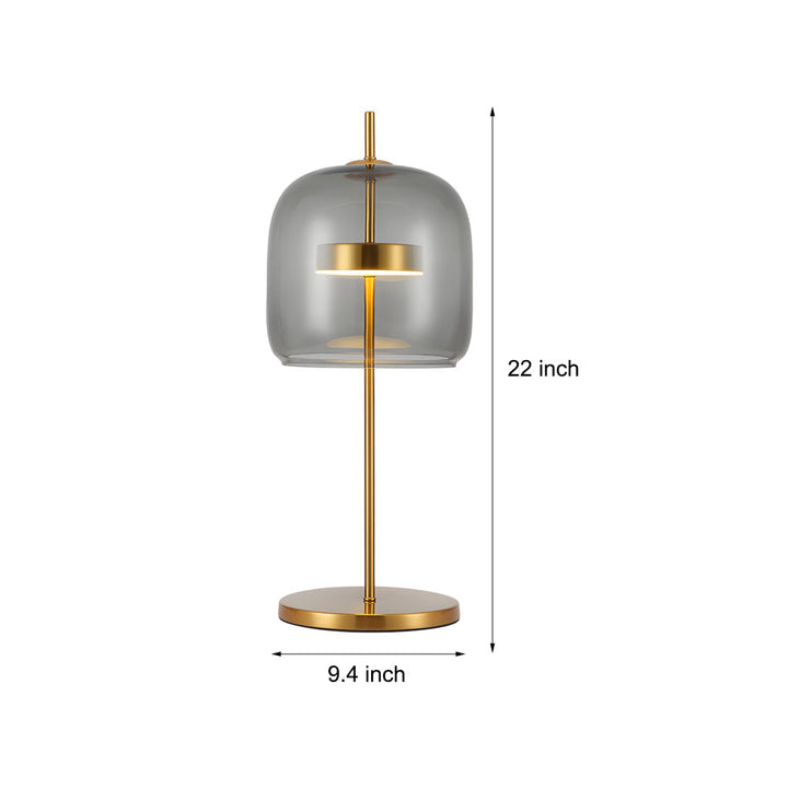 Lampa stołowa z przydymionego szkła, nowoczesny design, miękkie światło, idealna do wystroju wnętrz, ciepła atmosfera.