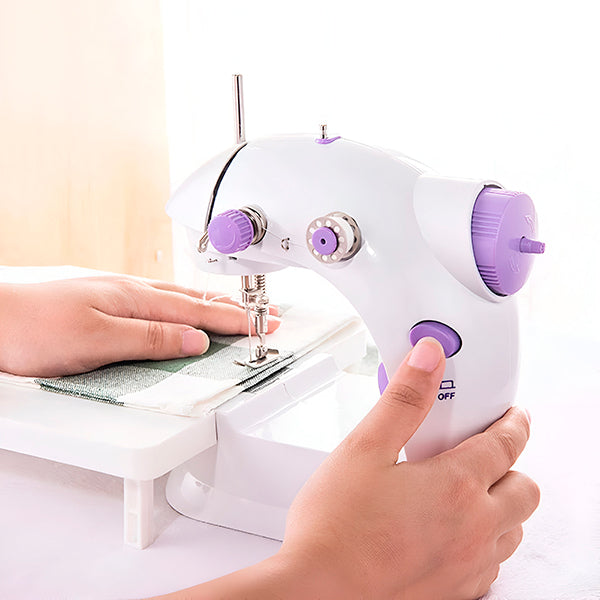 Kompaktowa, lekka, przenośna maszyna do szycia elektryczna, idealna do DIY, w klasycznym białym designie, z intuicyjną funkcjonalnością.